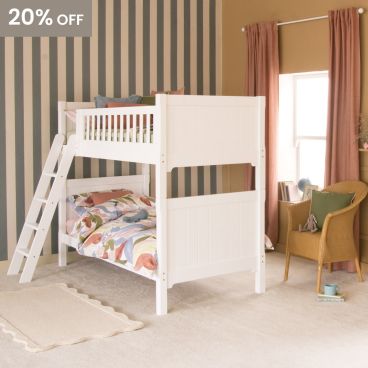 Pure White traditional bunk bed with sloped ladder in room with striped wallpaper