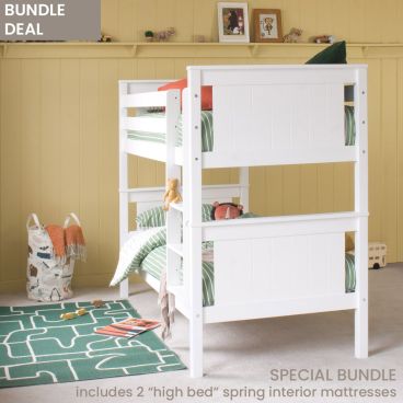 Pink and terracotta child's bedroom with pink curtains, lloyd loom chair and white shaker style child's bunk bed