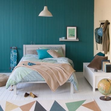 Grey and teal teen bedroom with small double bed, Grey, and skateboarding and cycling accessories