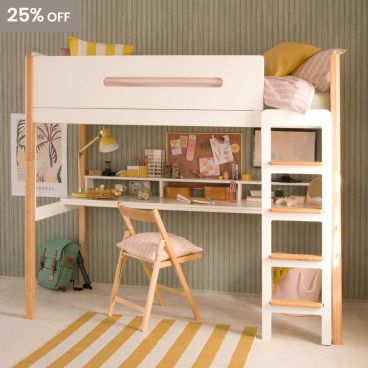 High sleeper bed with full length desk underneath with lots of art and craft projects on. memo board, lamp and computer screen too. The bed has a natural beech frame and white ends and sides.