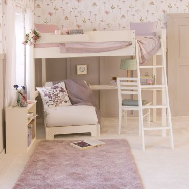country style bedroom with wildflower theme. Futon chair bed, curved desk and bookcase underneath 