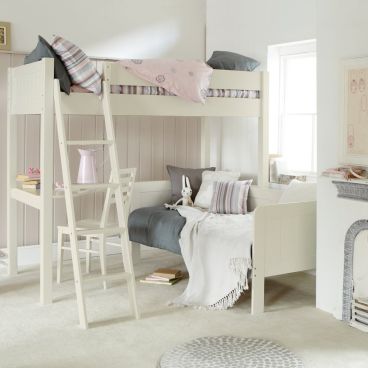 White bunk bed with corner desk and day bed, in girls bedroom