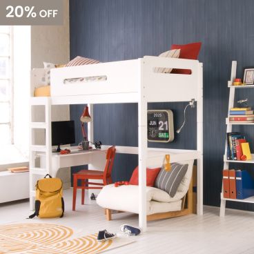 white high sleeper bed with lozenge cut out, roll out desk and futon underneath, in blue panelled older child's bedroom with mid century styled accessories and ladder shelf.