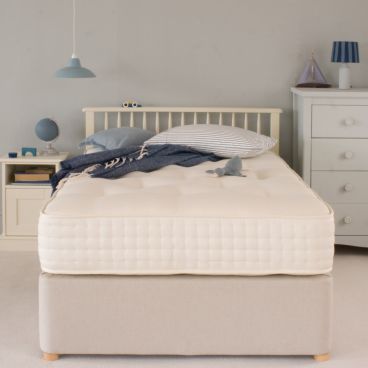 Luxury Small Double Bed Mattress with blue bedding, accessories and furniture in bedroom