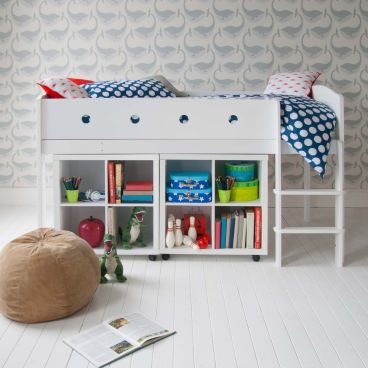 storage mid sleeper cabin bed in kids nautical themed bedroom 