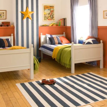 grey kids single beds as twin beds in childrens bedroom