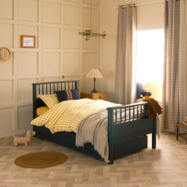 navy blue Painswick Blue spindle bed with trundle underneath