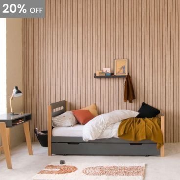 anthracite and beech single bed with trundle and desk with wooden strip panelled wall 