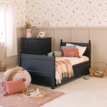 Navy blue bedroom set in country cottage style girls bedroom 