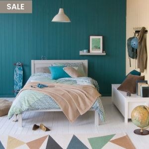 Grey and teal teen bedroom with small double bed, Grey, and skateboarding and cycling accessories