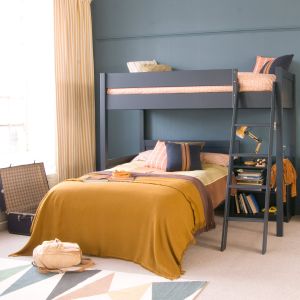 painswick blue high sleeper double loft bed with lower foot end and storage underneath, with mustard blanket and curtains