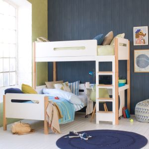 lime and blue bedroom with white and natural beech loft bed, day bed and desk underneath. Large window to the left of the photo