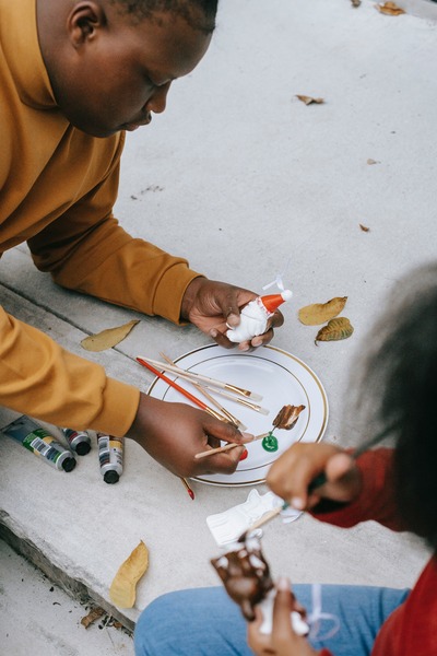 children learning to paint 