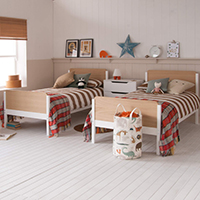 Edits single beds in white and oak 