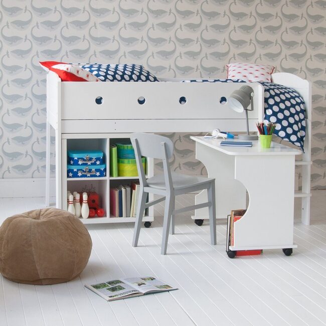 mid sleeper bed with whale wallpaper behind