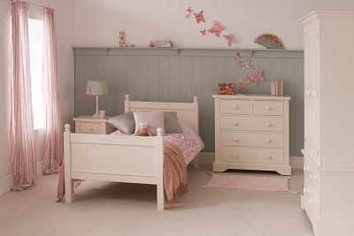 cream bedroom, green tongue and groove wall panelling, butterflies on wall