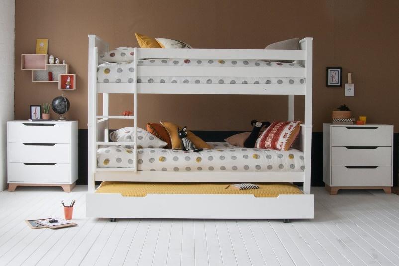 Classic Beech convertible Bunk bed with a sleepover and storage trundle and 2 chest of drawers. Solid beech frames and trundle on multidirectional castors for easy use.